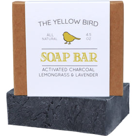 The Yellow Bird soap front packaging showing natural charcoal and organic ingredients benefits