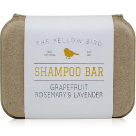 The Yellow Bird front bar shampoo showing clean shape and label, conveys gentle cleansing