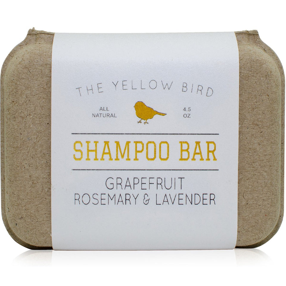 The Yellow Bird front bar shampoo showing clean shape and label, conveys gentle cleansing