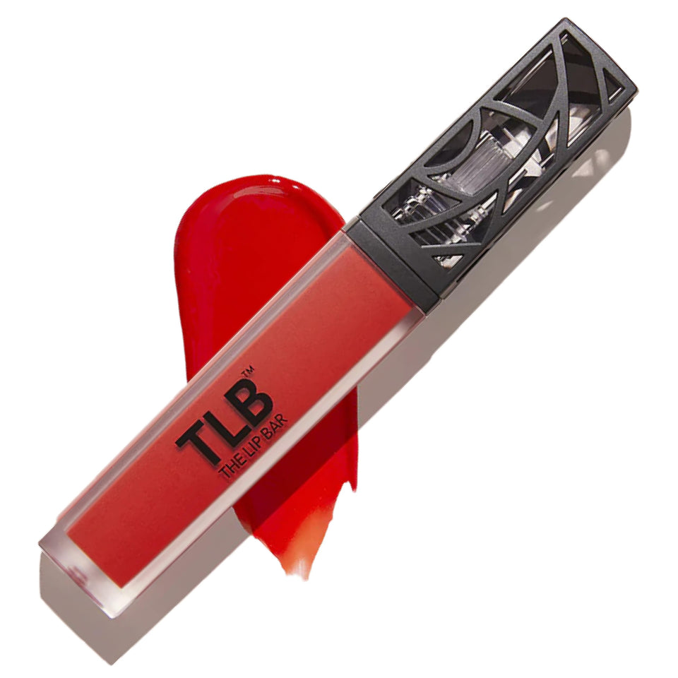 The Lip Bar front tube showing Boy Trouble red-orange, vibrant payoff