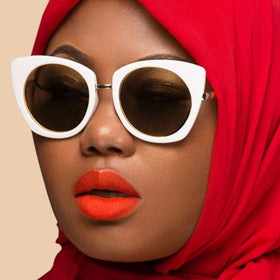 Lifestyle flatlay of The Lip Bar Boy Trouble in a vanity scene for style inspiration