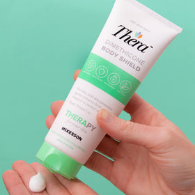 Thera jar on bathroom nightstand suggesting daily routine and skin comfort