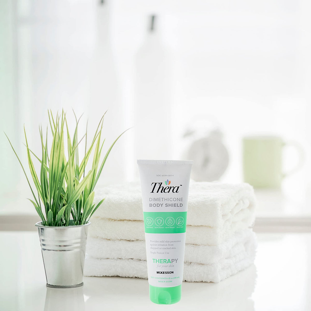 Thera caregiver applying cream to elderly skin showing gentle protective care