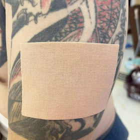 Therasports applied on forearm demonstrating smooth concealment and comfortable fit