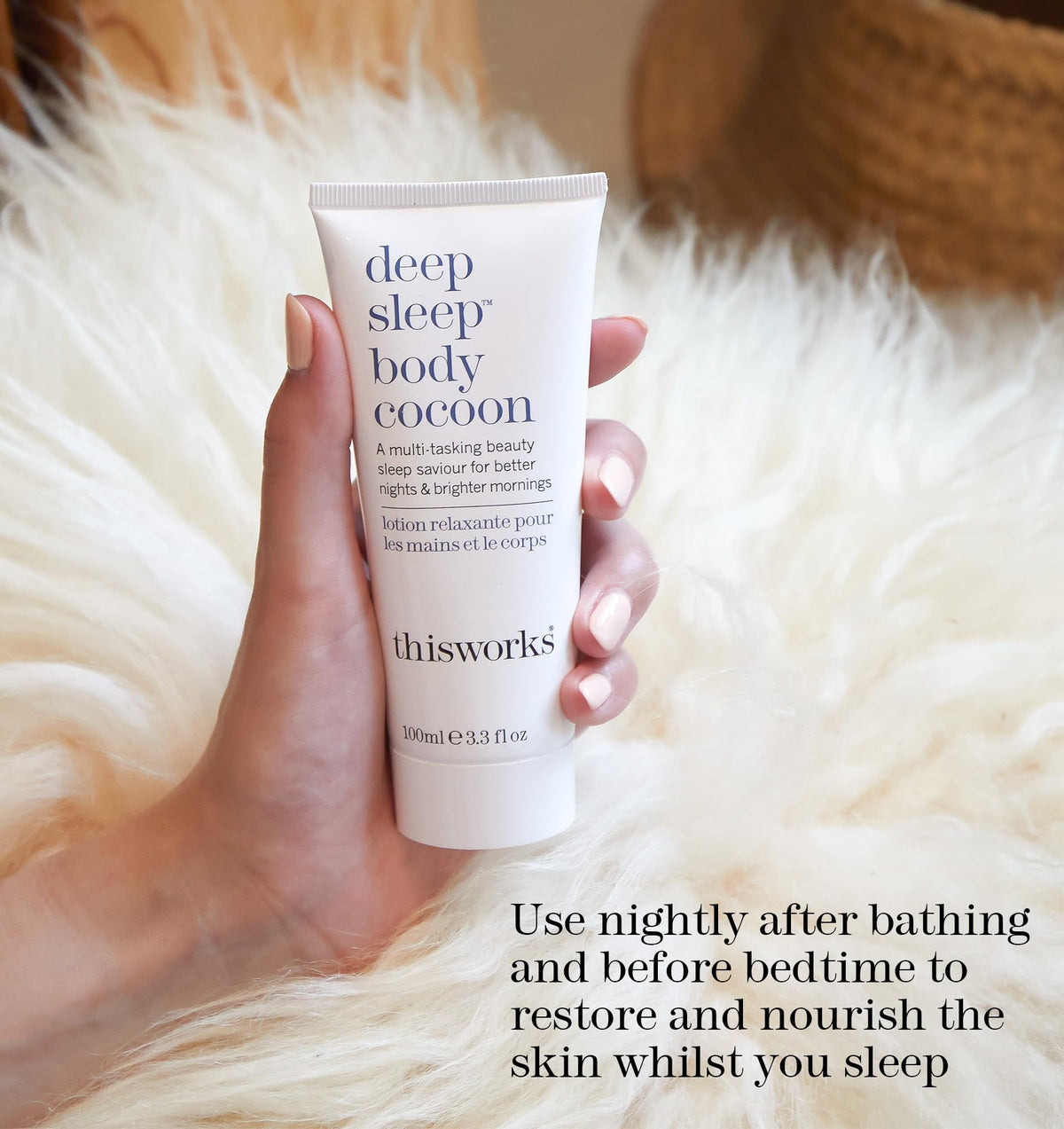 THISWORKS tube in hand demonstrating 100ml travel-friendly size and easy squeeze