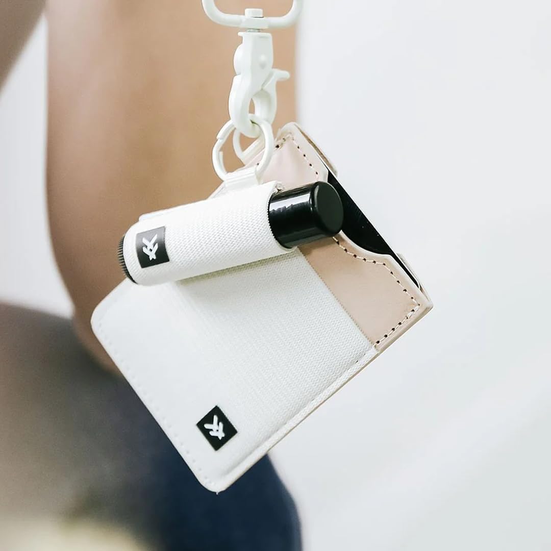 Thread Wallets clipped to a backpack illustrating grab-and-go benefit