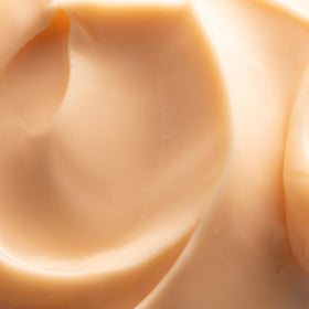 Three Ships open jar top view displaying buttery cream and smooth surface