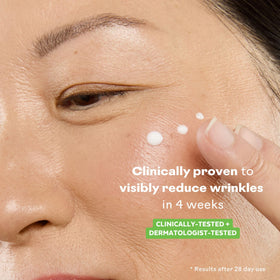 Three Ships bottle next to a ruler demonstrating the 30 mL scale