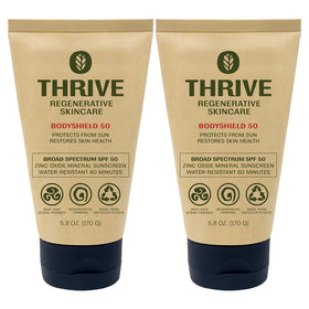 Thrive Natural Care front packaging showing SPF50 and reef safe benefits