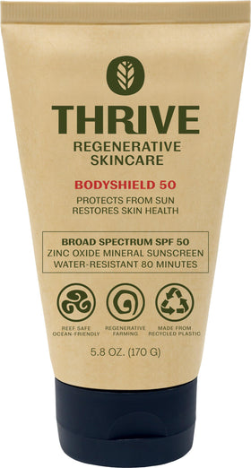 Thrive Natural Care front packaging showing SPF50 and reef safe benefit