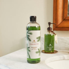 Thymes label close-up highlighting Frasier Fir fragrance details and benefits