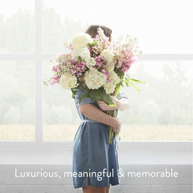 Thymes Kimono Rose pump in shower scene demonstrating single-handed use and convenience