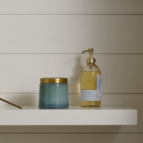 Thymes pump close-up highlighting dispenser and textured bottle for easy use