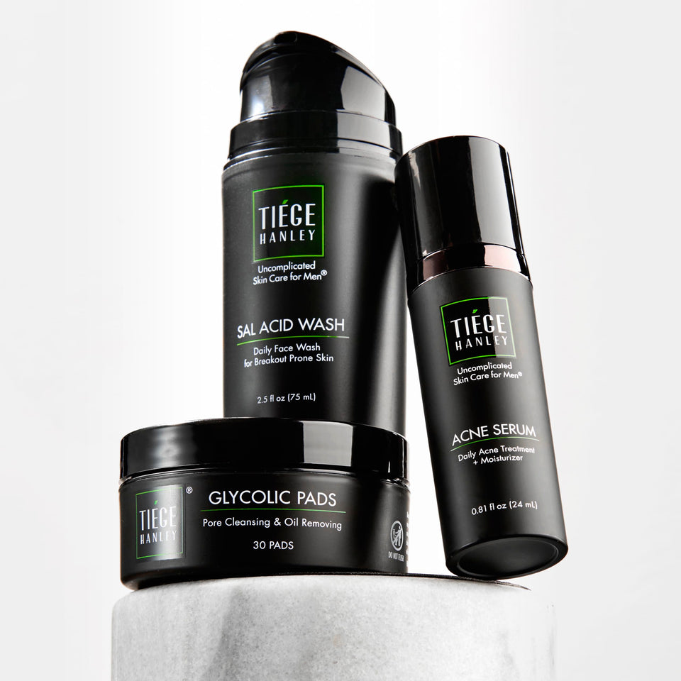 Tiege Hanley kit front packaging showing all three products and simplified routine benefits