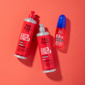 Model with restored hair after using TIGI Bed Head showing smooth shine and manageability