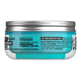 TIGI Bed Head Manipulator open jar texture close-up, shows paste consistency and spreadability