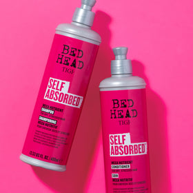 TIGI Bed Head size comparison next to hand showing 25.36 fl oz scale