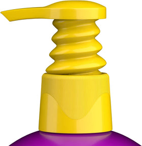TIGI Bed Head styling in use on model adding volume and heat protection while blow-drying