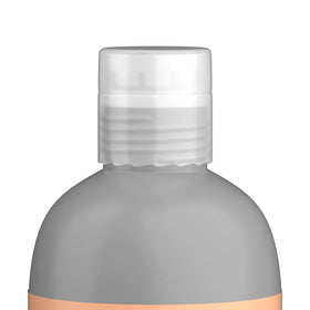 TIGI bottles held in hand to show 25.36 fl oz size and travel convenience benefit