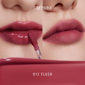 TIMEPHORIA application close-up on lips demonstrating glossy-to-matte transformation benefit: visible set