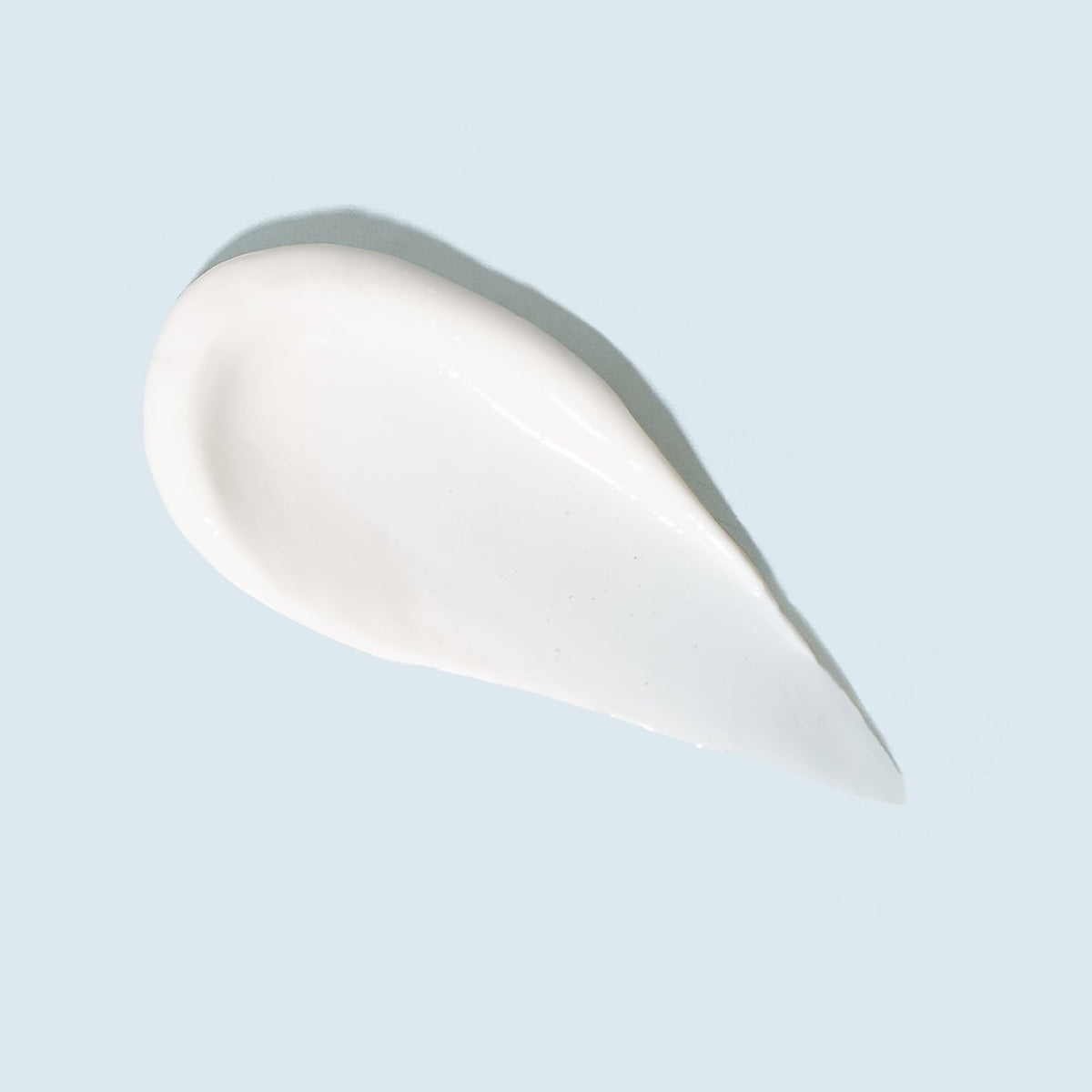 TIZO cream texture close-up demonstrating smooth moisturizing finish