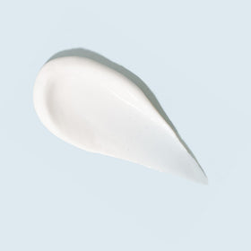 TIZO cream texture close-up demonstrating smooth moisturizing finish