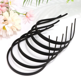 TOBATOBA headband beside a hand to show scale and flexible durable construction benefit