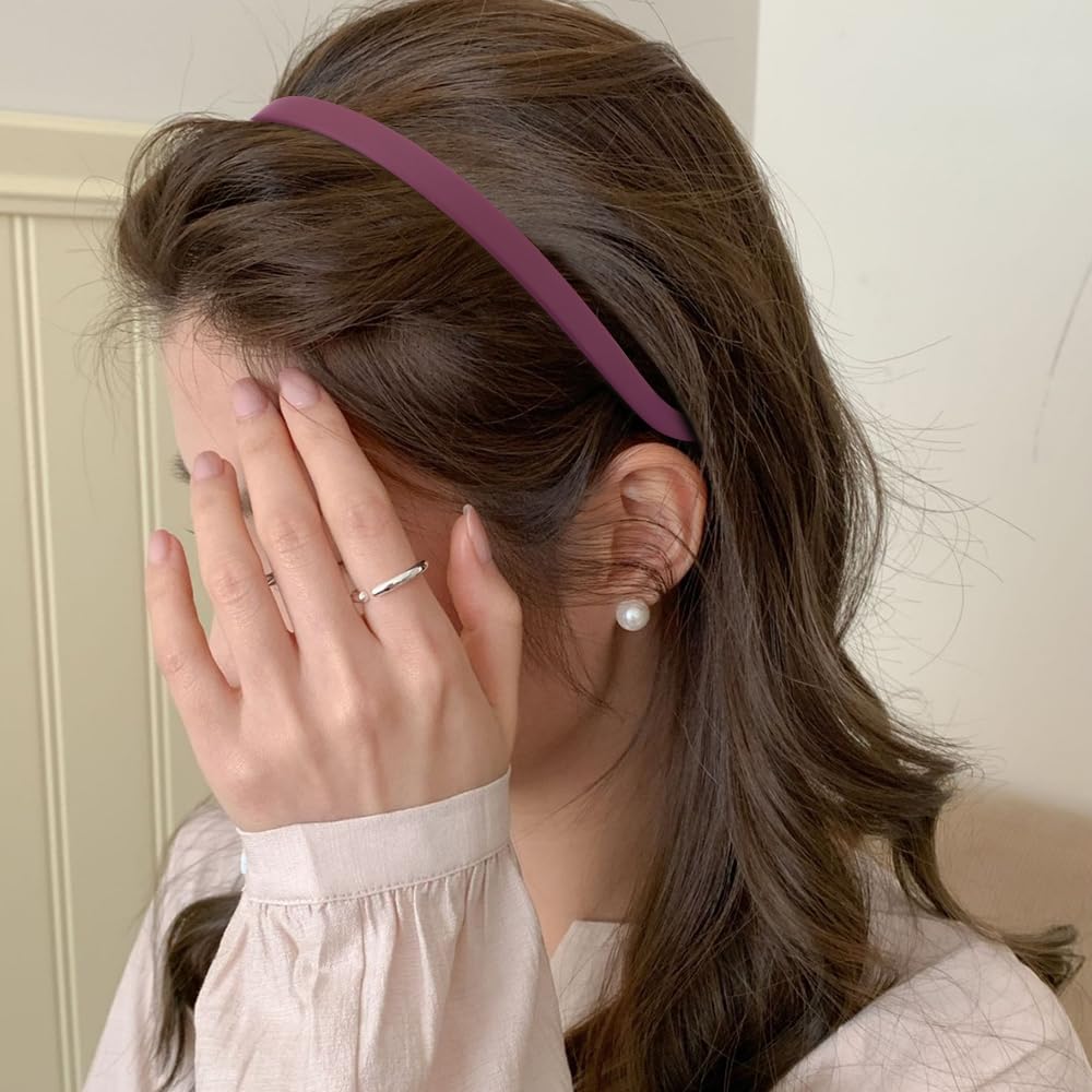 TOBATOBA model wearing headband outdoors showing hair control benefit