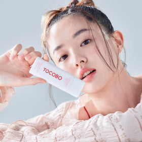 TOCOBO applied to face demonstrating subtle pink tone-up effect