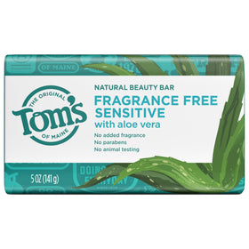 Tom's of Maine unwrapped bar label visible to emphasize fragrance-free, dermatologist-tested benefit