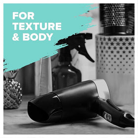 TONI&GUY 6.8 oz bottle beside everyday items to show true size