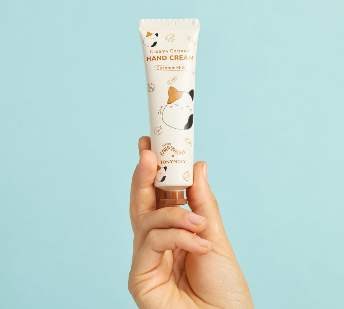 TONYMOLY Cam hand cream texture close-up highlighting creamy hydration