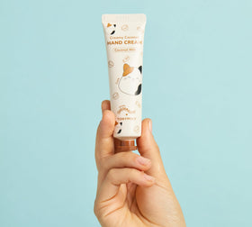 TONYMOLY Cam hand cream texture close-up highlighting creamy hydration