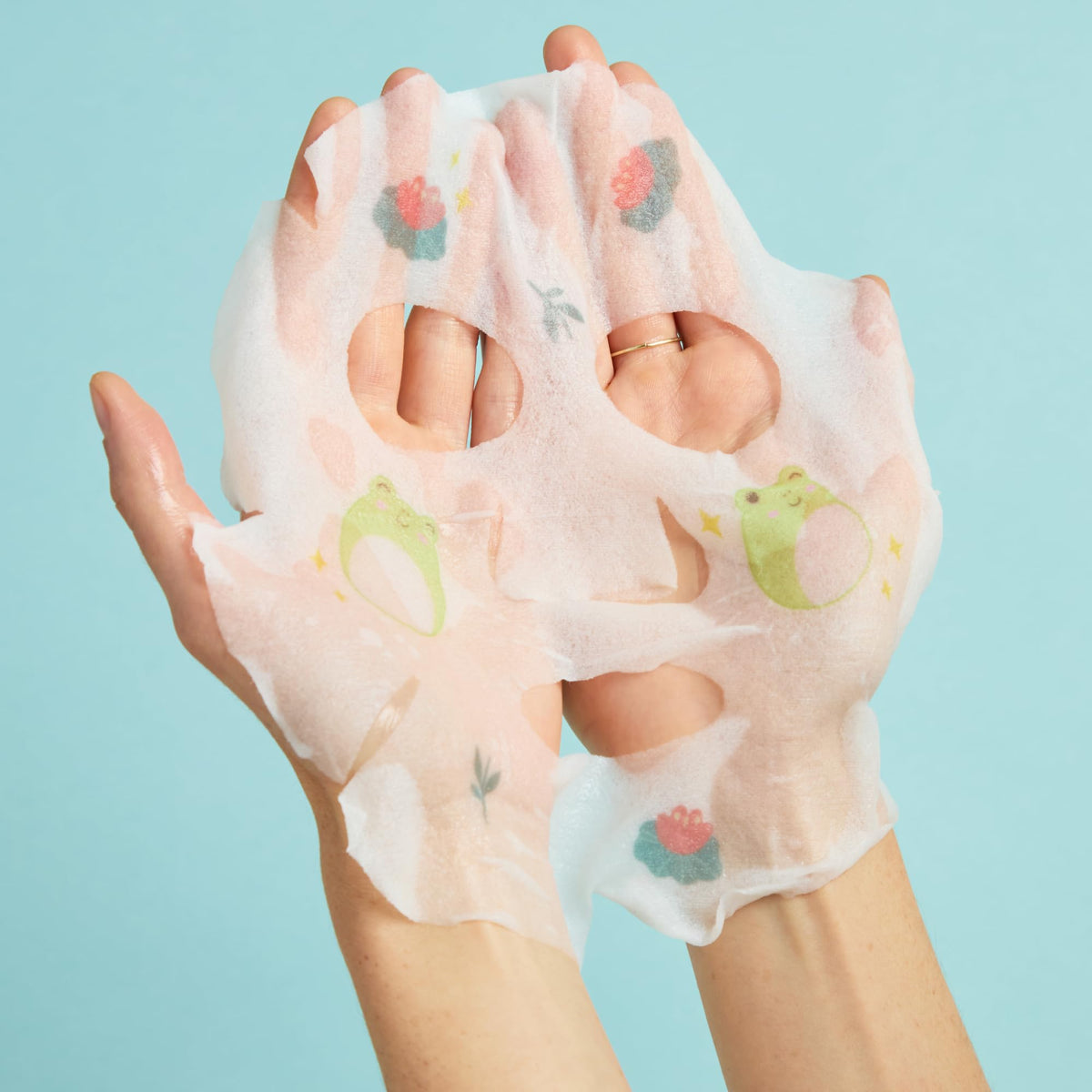 TONYMOLY foot mask pouch highlighting shea butter for deeply nourished feet