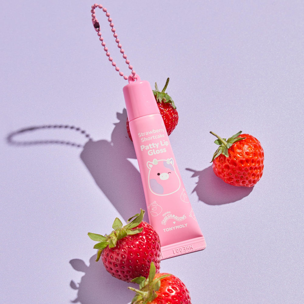 TONYMOLY Patty hand cream and lip gloss flatlay styled as a gift set