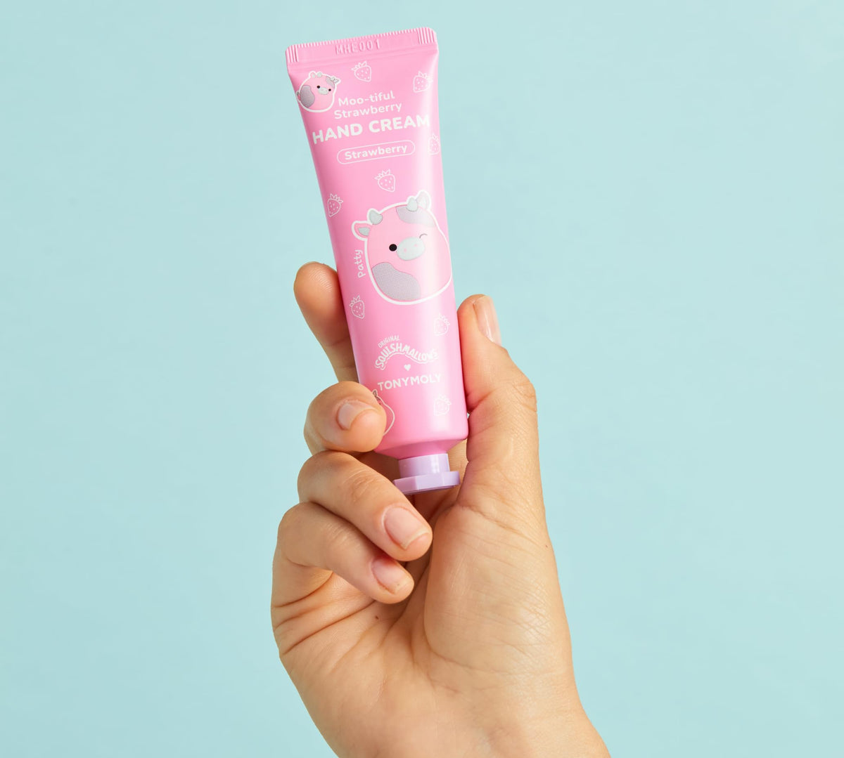 TONYMOLY hand cream tube close-up showing texture and easy-to-squeeze applicator