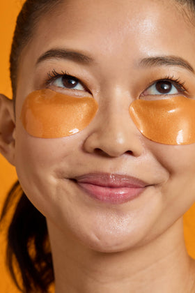 TONYMOLY eye patches applied under eye demonstrating immediate refreshing effect