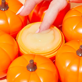 TONYMOLY ingredients flatlay with pumpkin and ginger highlighting natural extracts and antioxidant benefits