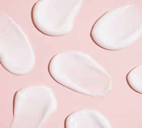 TONYMOLY cream on hand being spread to show hydration without greasiness