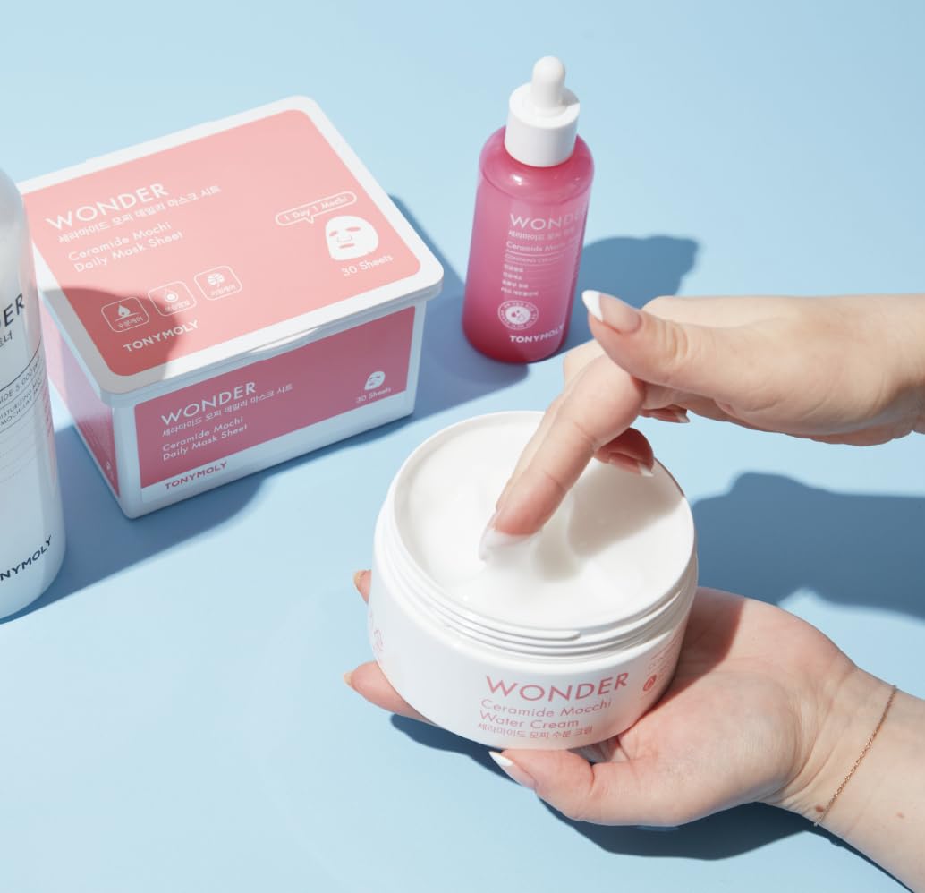 TONYMOLY jar beside a coin to display compact travel-friendly size
