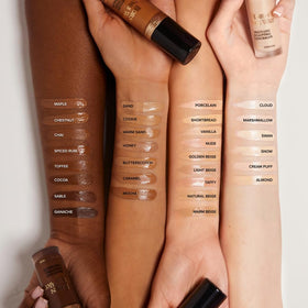 Too Faced concealer applicator close-up showing smooth precise application