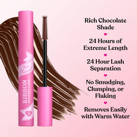 Too Faced wand swatch in chocolate shade showing rich black-brown pigment