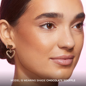 Too Faced Chocolate Soleil being blended with fingers to demonstrate quick natural-looking warmth