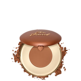 Too Faced compact front view highlighting brand and portable design benefit
