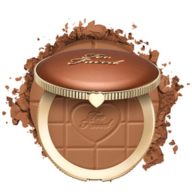 Too Faced compact front view showing sleek design and travel-ready benefit