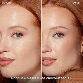 Too Faced powder pan close-up showing cocoa-infused texture and smooth finish benefit