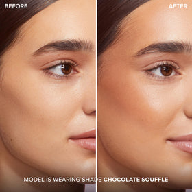 Too Faced Chocolate Soleil texture swatch on skin highlighting smooth blendability and satin finish