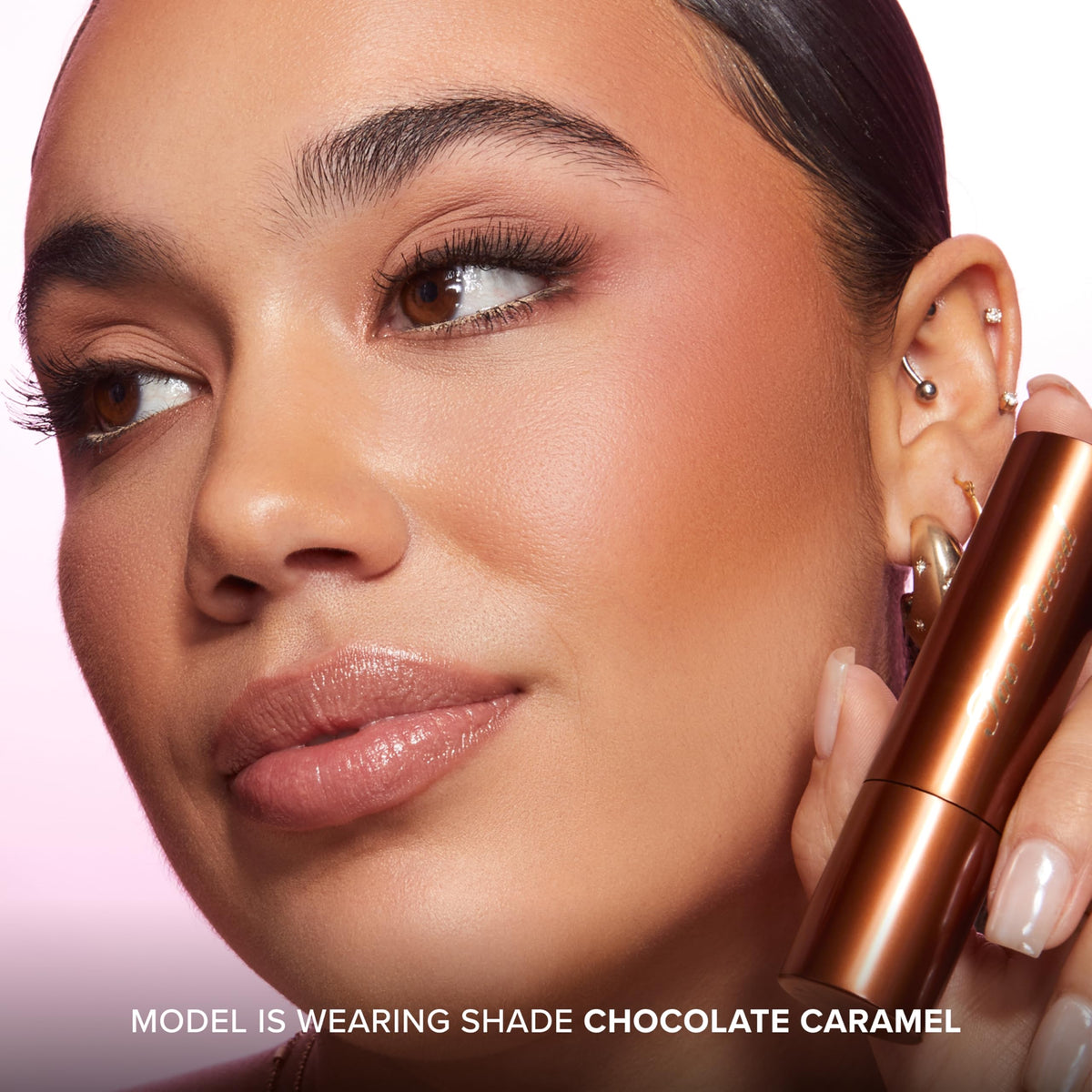 Too Faced stick with brush showing blending versatility and quick application
