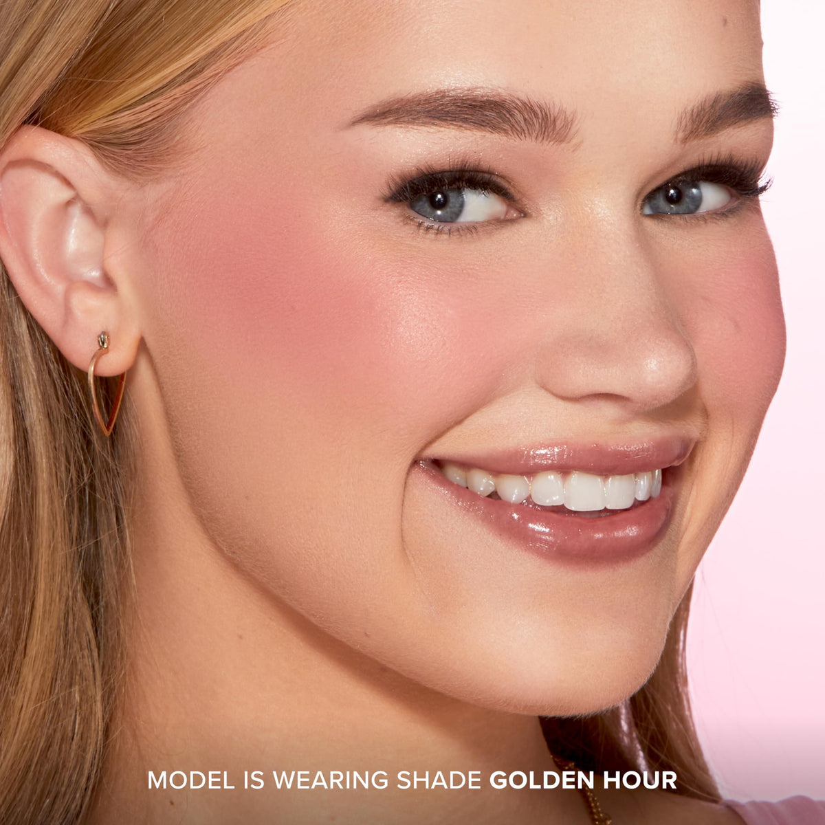 Too Faced blush being applied with brush showing seamless blurring benefit