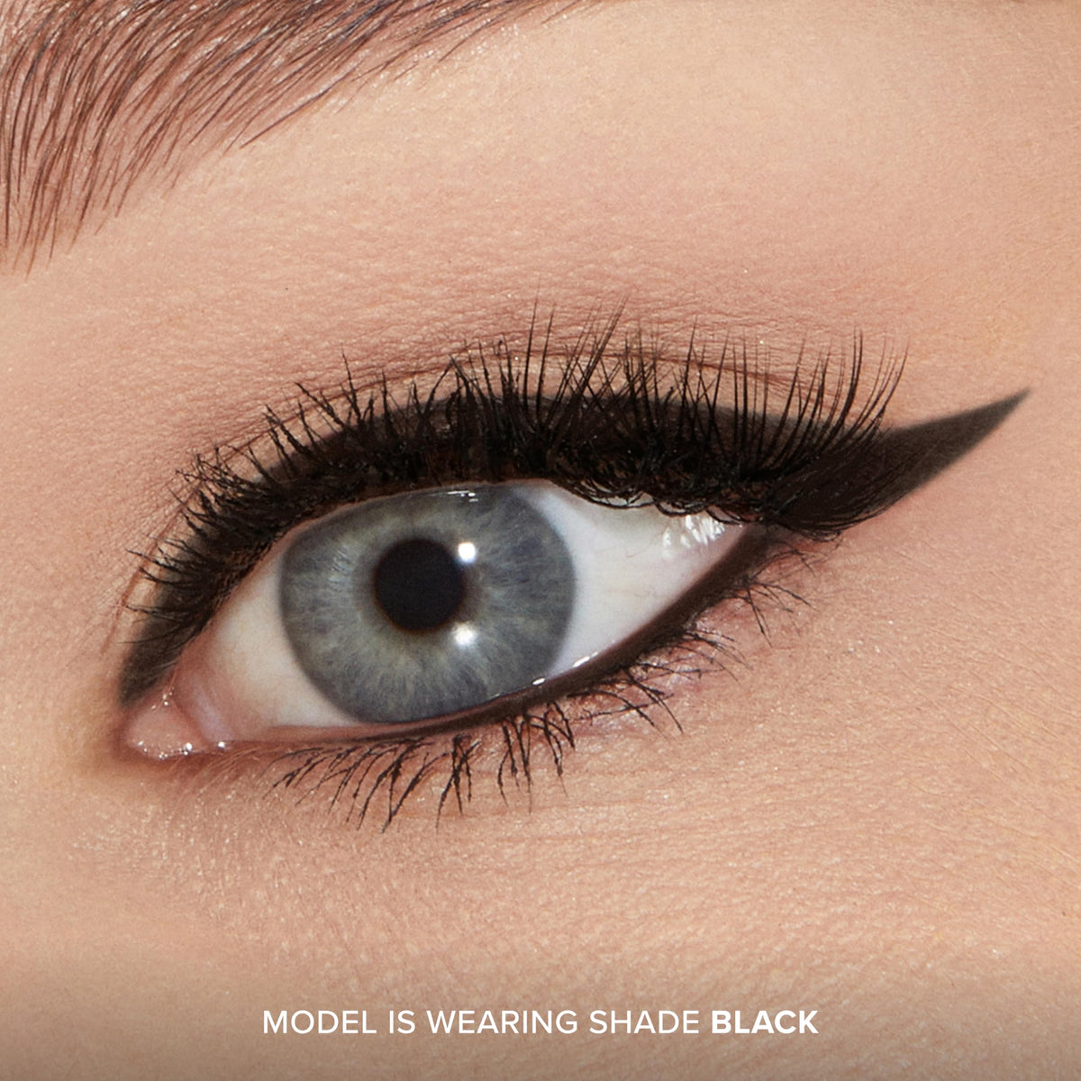 Too Faced open cap revealing pencil tip and sharpenable design for control